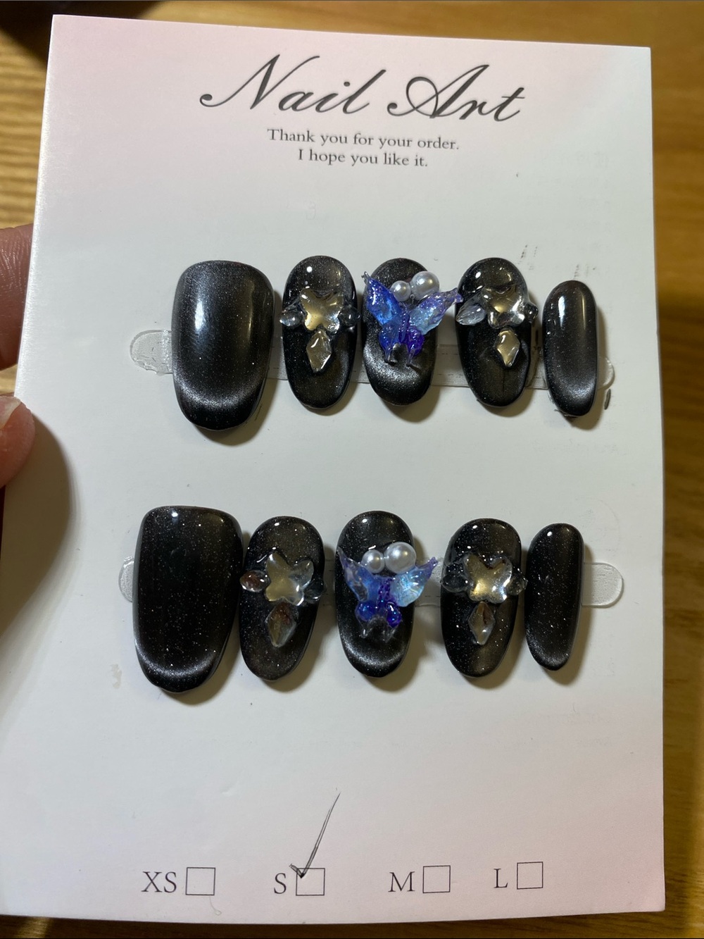 Black Iridescent Press-On Nails with Blue Crystal Accents